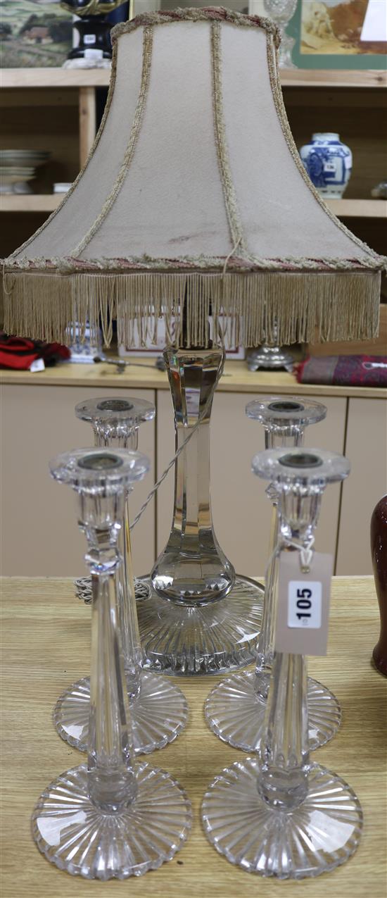 A cut glass, table lamp and set of four candlesticks